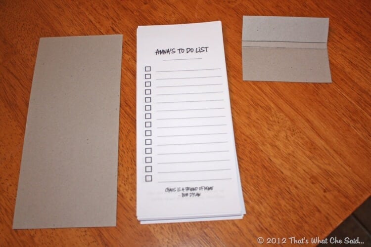 Pieces of Note Pad:  Cardboard backing, paper sheets trimmed to size (75) and cardboard topper