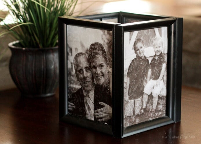 A photo luminary on the end table in a living room