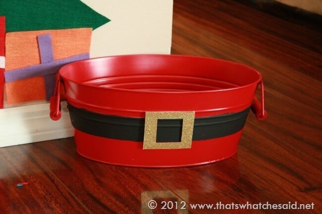 Red bin with painted black "belt" and gold cardstock buckle to resemble Santa