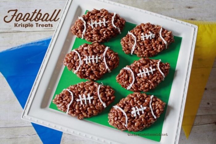 Cocoa Rice Krispie Treats molded into football shapes with icing laces