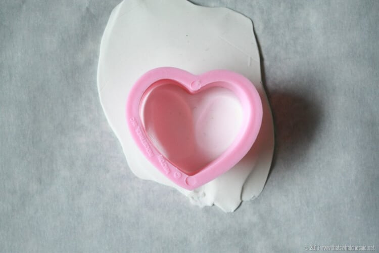 polymer clay with thumbprints and heart cookie cutter to cut heart shape!