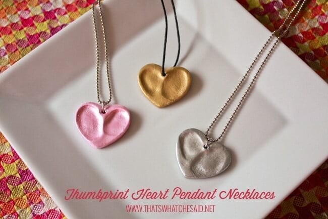 Heart charms made from oven bake clay and impressed with thumbprints to create the perfect keepsake