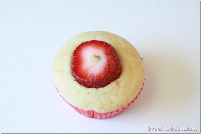 cut cupcake with strawberry