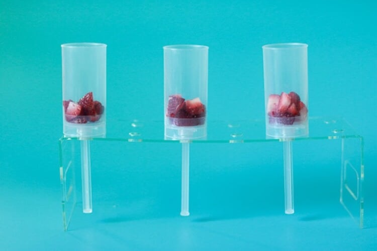 Add Strawberries to push pop containers for first layer