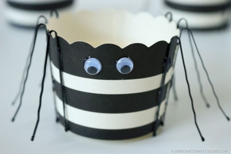 Add Googley Eyes to the treat cup to give spider a face