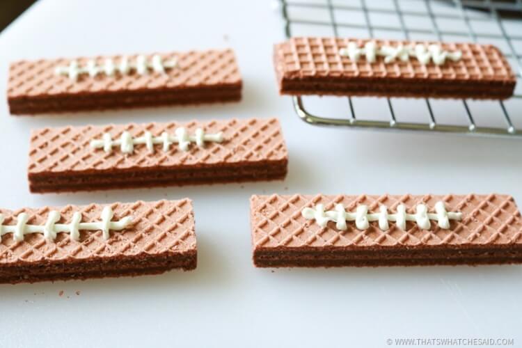 Create Football Treats from Chocolate Wafer Cookies Icing