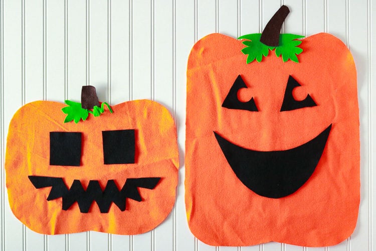 Felt Pumpkin Toddler & Preschool Halloween Activity Pumpkin Shapes cut from felt with different mix/match face pieces for toddlers to create themselves.