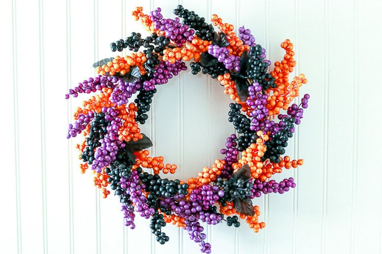 Wreath made from Faux Black, Purple and Orange Berry Floral Sprigs