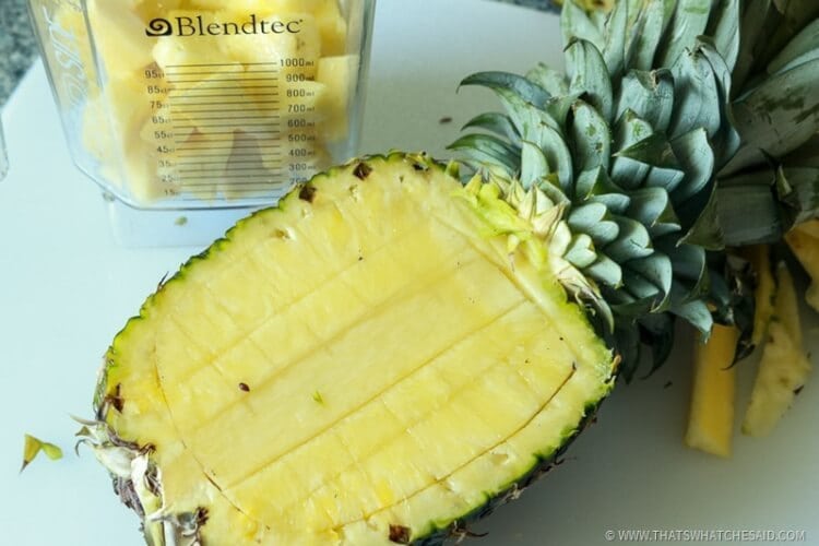 Score Flesh of Pineapple - be sure not to cut shell