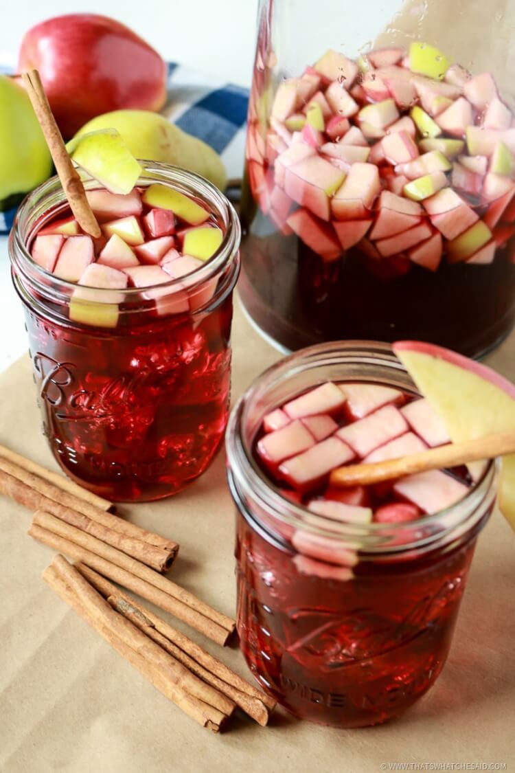 Thanksgiving Sangria in glasses with pitcher in background