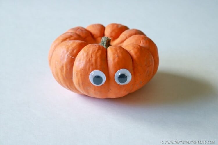 Glue Eyes onto Pumpkin