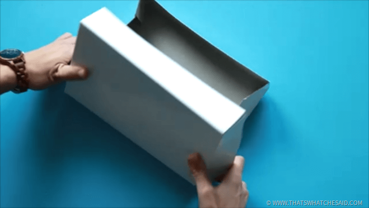 folding the large box into a smaller box