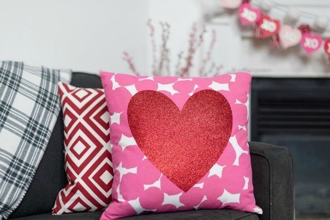 Pink and white pillow with glitter heart
