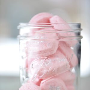 Mason Jar filled with pink heart bath bombs