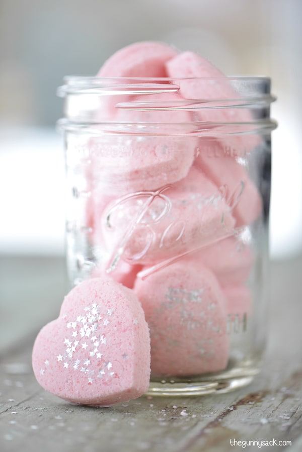 Mason Jar filled with pink heart bath bombs