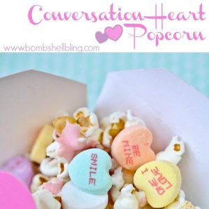 Popcorn Treat mixed with conversation hearts in a Chinese to go box