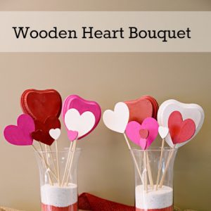Wooden hearts on sticks grouped in a vase as a bouquet