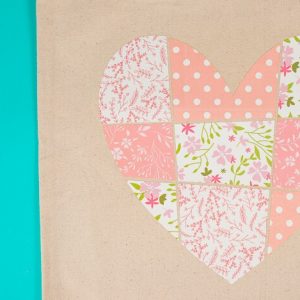 Garden flag with patchwork heart in patterned iron on
