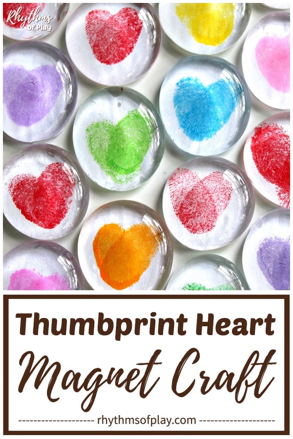 Clear gem magnets with finger prints in the shape of a heart