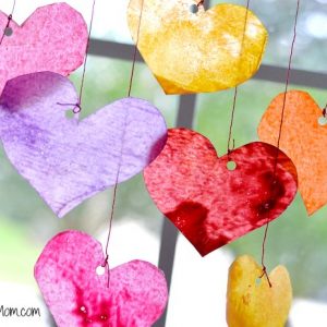 diy heart suncatchers in front of a window