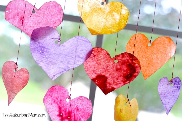 diy heart suncatchers in front of a window