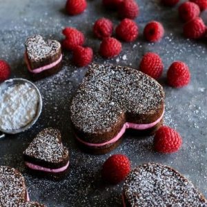 Heart brownie sandwiches with raspberry buttercream centers