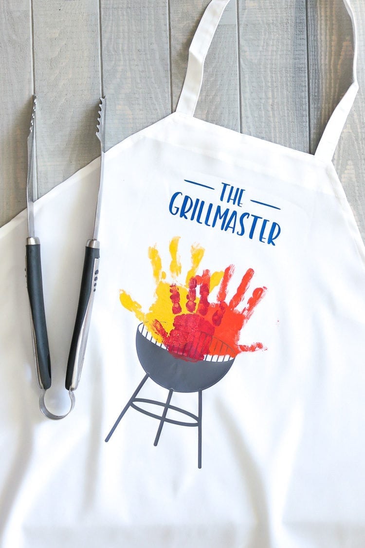 The Grillmaster BBQ Grill Apron with handprints