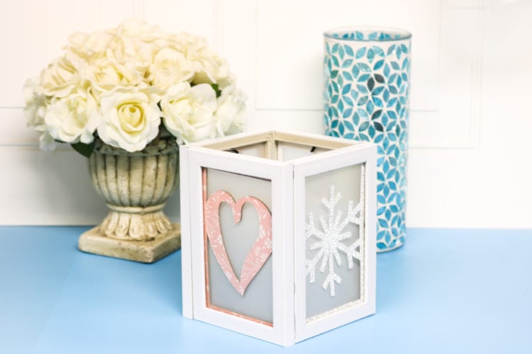 Photo frame luminary with added seasonal inserts made with the Cricut Maker