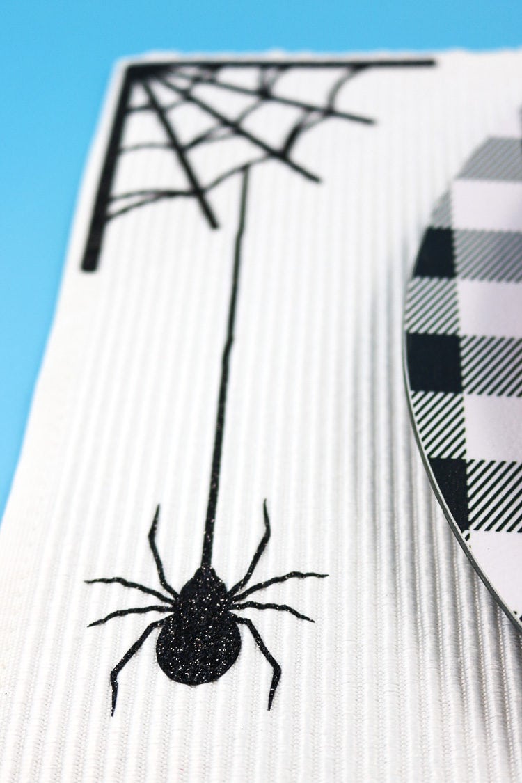 White Placemat with Spider Web & Hanging Spider in black glitter iron-on