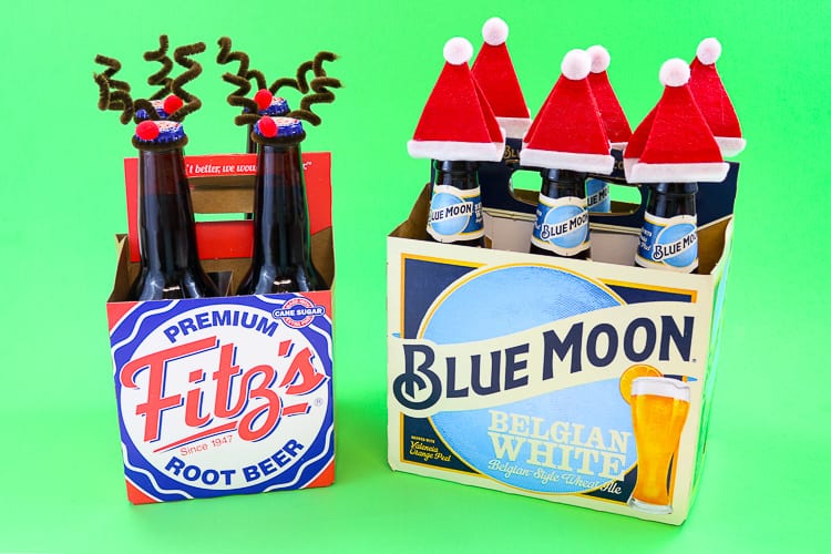 4 pack of RootBeer dressed as Reindeer and a 6 pack of beer Dressed like Santa!