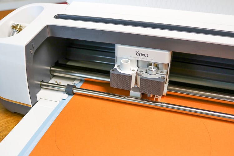 Cricut with Orange Cardstock loaded