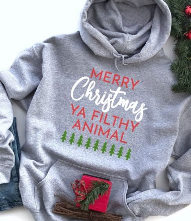 Merry Christmas Ya Filthy Animal SVG file on a Hoodie for Christmas
