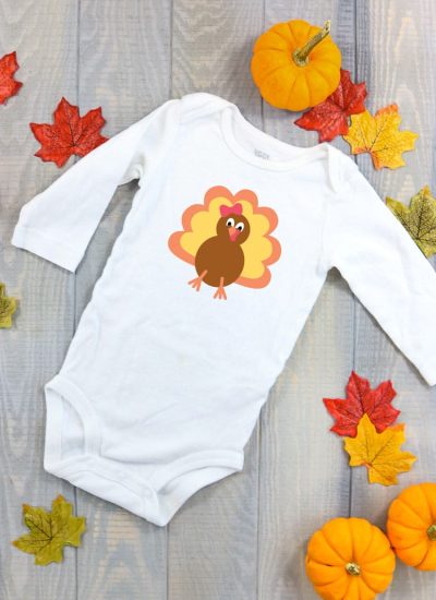 White Baby Bodysuit with Turkey on the Front. Grab the whole bundle of 7 designs to mix and match