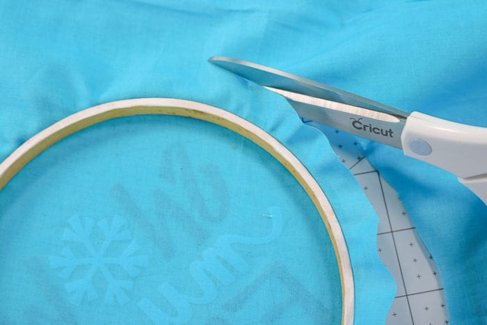 Trimming fabric to finish embroider hoop project