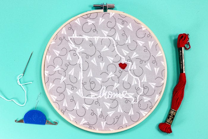 Finished Embroidery Hoop Project with patterned fabric backing