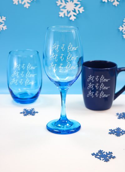 Blue Stemless wine glass, regular wine glass and coffee mug with Let it Flow SVG