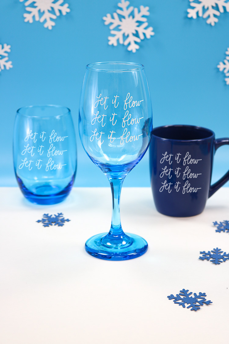 Blue Stemless wine glass, regular wine glass and coffee mug with Let it Flow SVG
