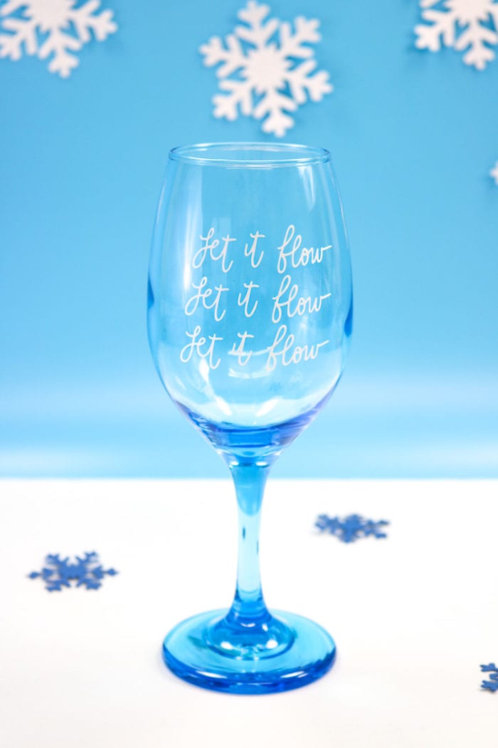 Blue Wine Glass with Let it Flow, Let it Flow, Let it Flow in Vinyl