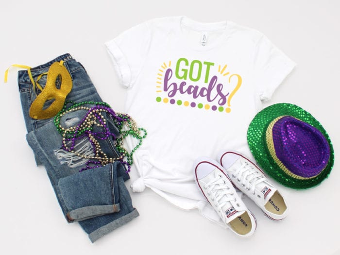 Mardi Gras Tshirt with beads, mask, hat and jeans/converse