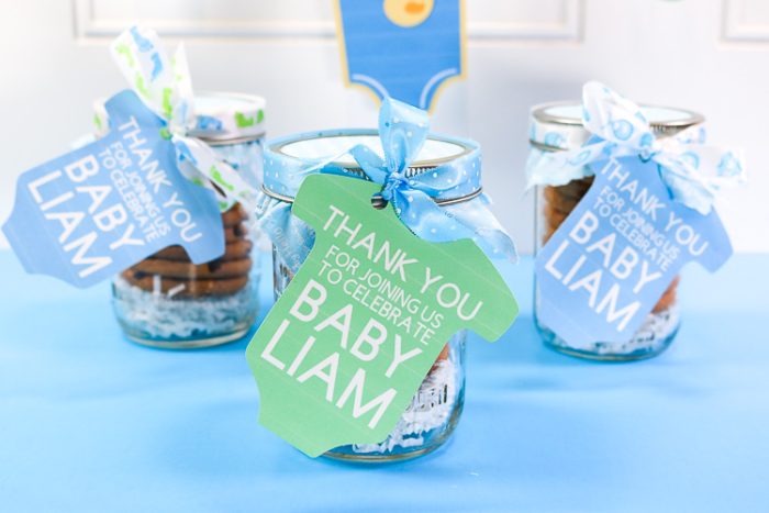 Cookie Jar Baby Shower Favors with Print Then Cut Tags in mason jars wrapped with ribbon