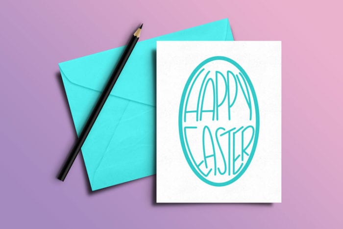 Pink/purple background with hand lettered card and aqua envelope