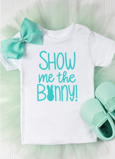 mint tutu with whtie top and mint bow and mocassins. Show me th bunny is on the shirt