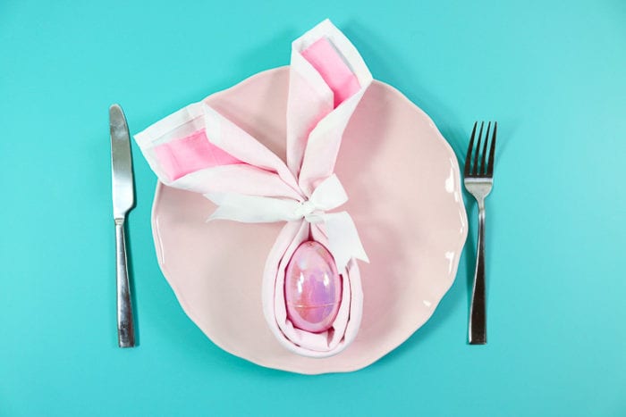 pink plate with pink folded bunny napkin