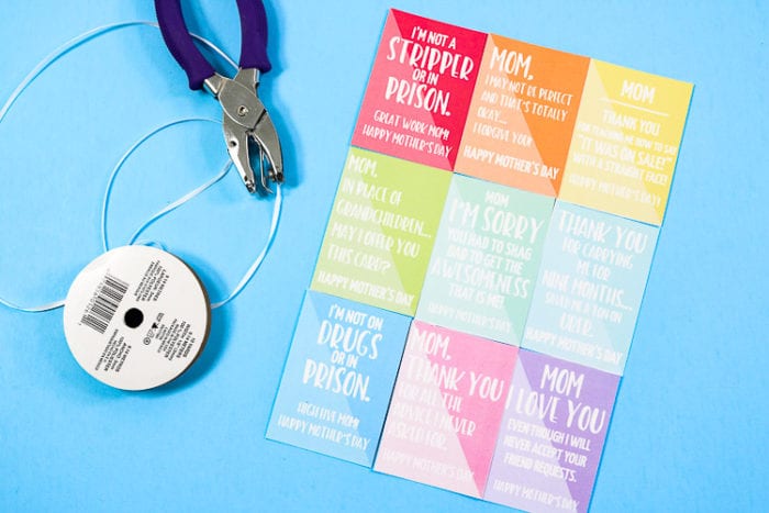 Printed Gift Cards with Sarcastic & Funny sayings for Mother's day. Laid out with a hole punch and ribbon.