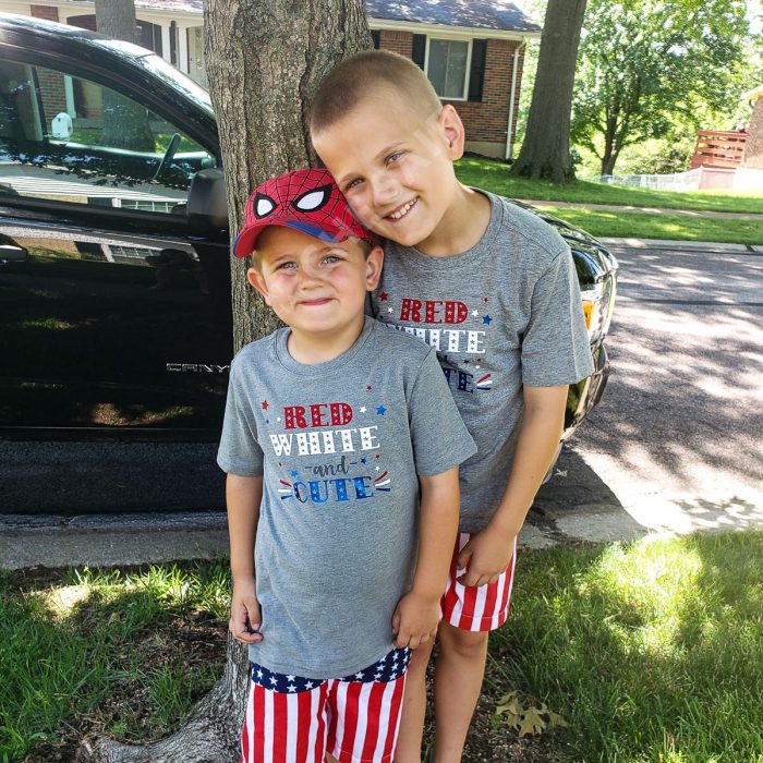 Brothers wearing red white and cute matching 4th of July shirts