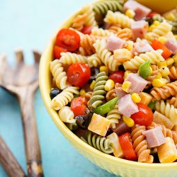 Bowl of Easy Pasta Salad with Utensils