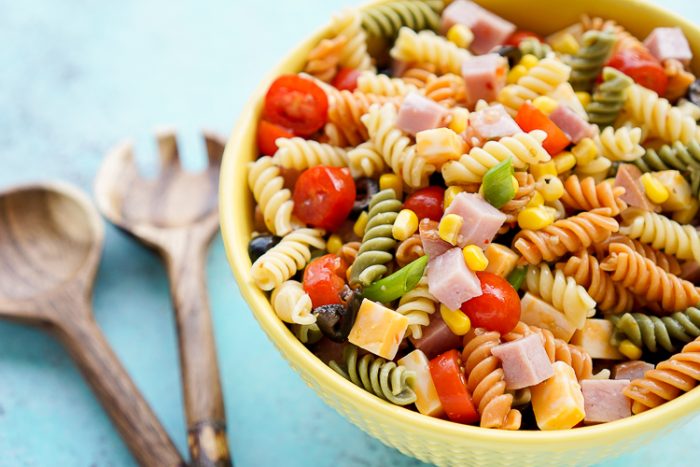 Bowl of Easy Pasta Salad with Utensils