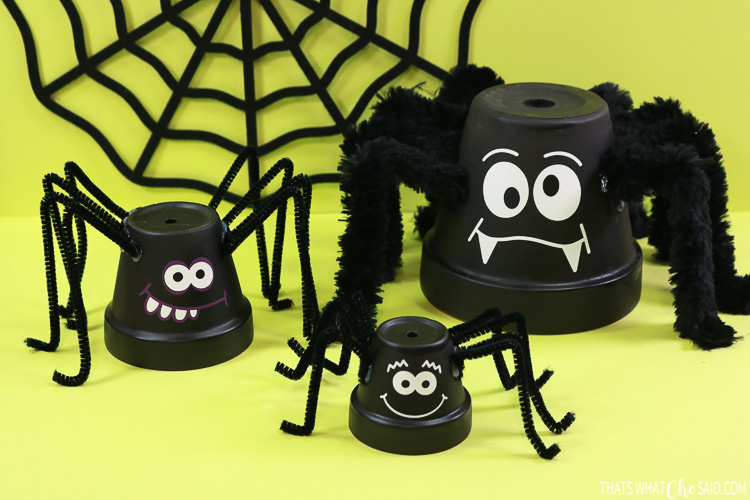 Three clay pots turned into spider halloween decor