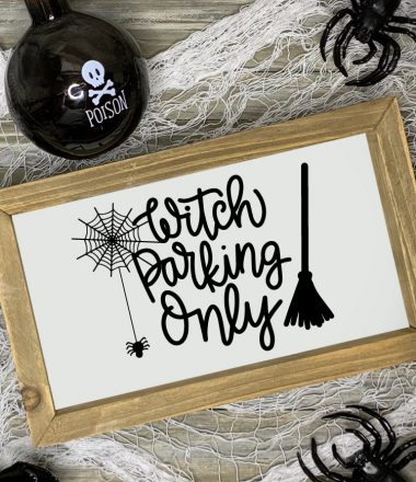 Halloween scene with "Witch Parking Only" Sign