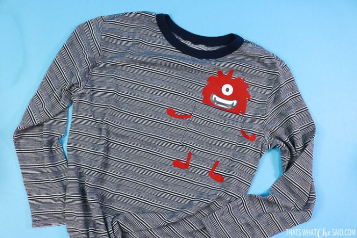 Boy's T-shirt with iron-on monster on the pocket